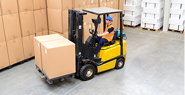 Professional forklift operator with precise handling and safety
