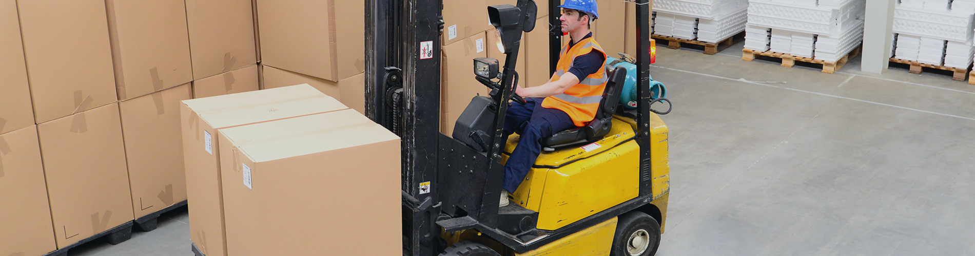 Professional forklift operator with precise handling and safety